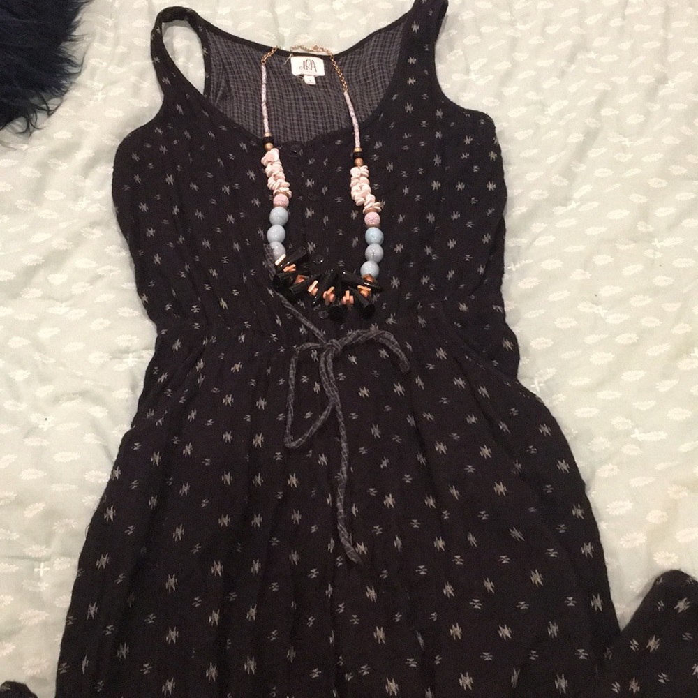 Anthropologie jumpsuit in navy tribal print.
